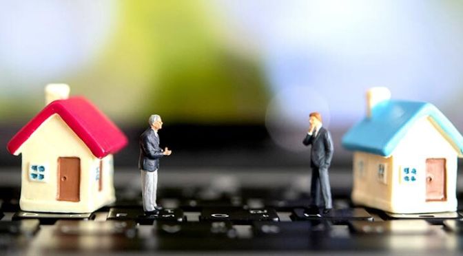 image of figurines of commercial real estate agents social distancing