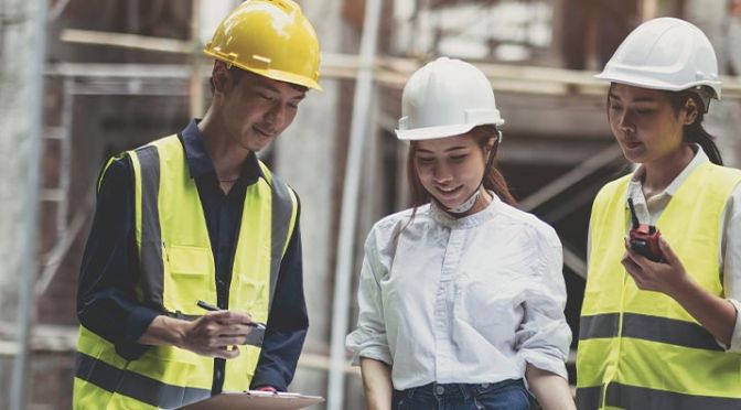 image of construction workers with hard money construction loan